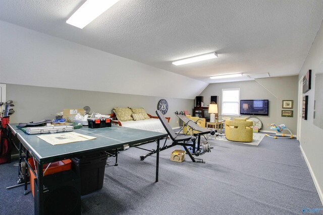 rec room with baseboards, a textured ceiling, lofted ceiling, and carpet floors