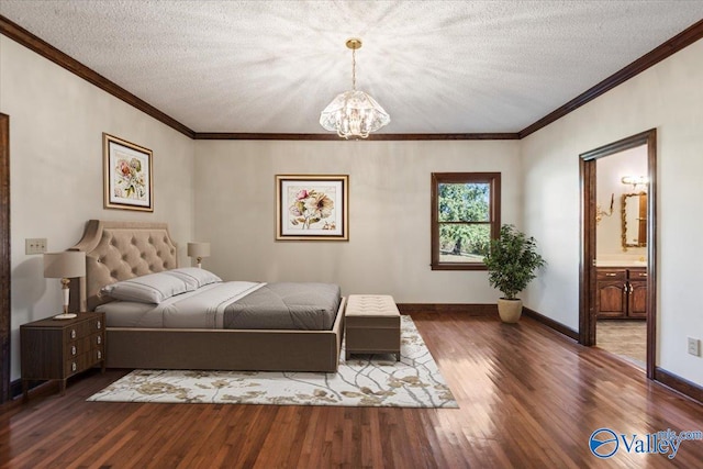 bedroom with a chandelier, a textured ceiling, ensuite bath, and dark wood-type flooring