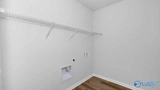 laundry area featuring electric dryer hookup, washer hookup, and hardwood / wood-style flooring