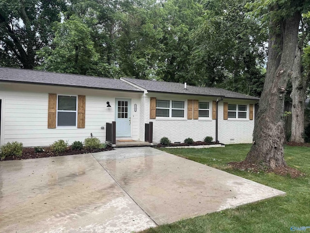 2205 Euclid Rd, Huntsville, AL 35810 - ranch-style home with a front yard and brick siding