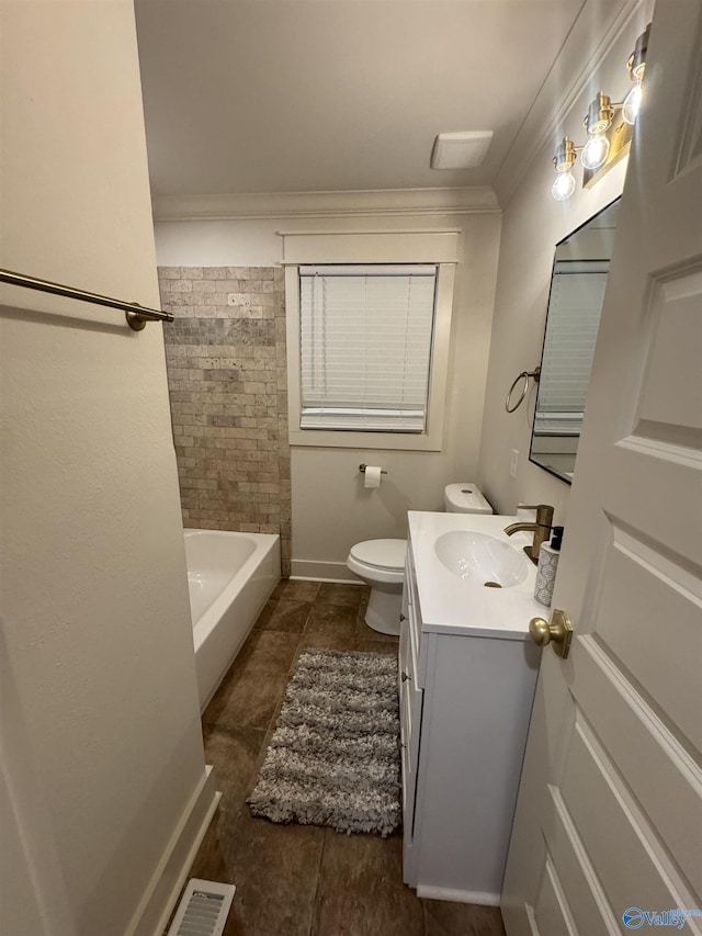 2205 Euclid Rd, Huntsville, AL 35810 - full bath featuring vanity, ornamental molding, toilet, tile patterned floors, and baseboards