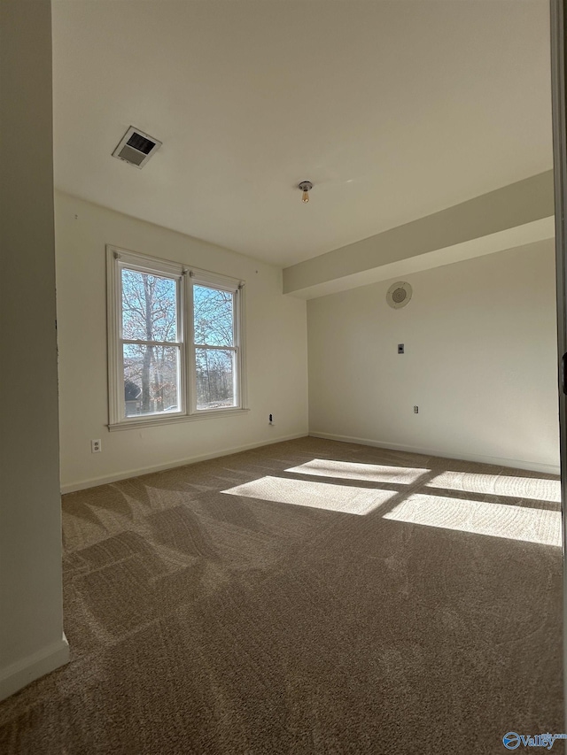 view of carpeted spare room