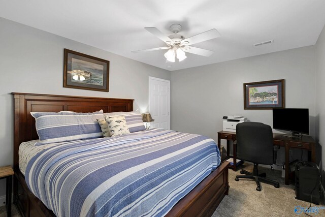 carpeted bedroom featuring ceiling fan