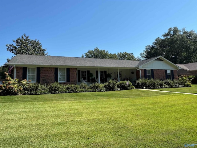 ranch-style house with a front yard