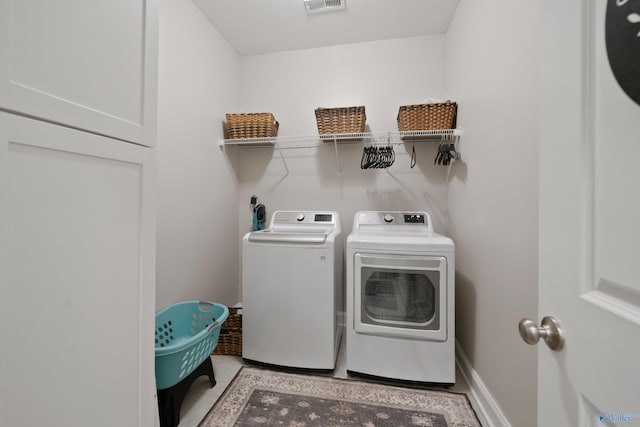 laundry room featuring washer and dryer