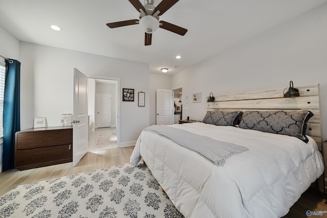 bedroom featuring light wood-type flooring and ceiling fan