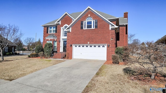 front facade with a garage and a front lawn