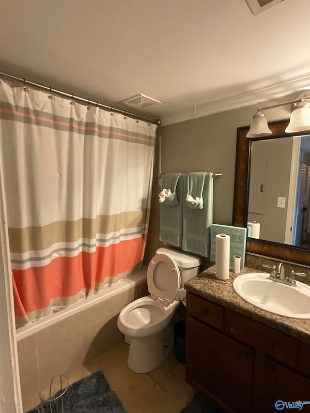 full bathroom with vanity, tile patterned flooring, shower / tub combo, and toilet