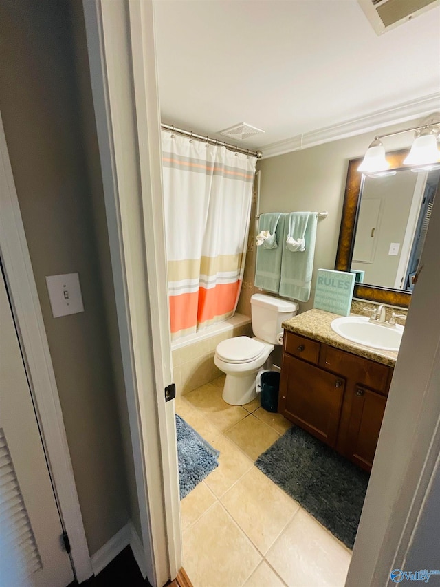 full bathroom featuring vanity, toilet, tile patterned floors, and shower / bath combination with curtain