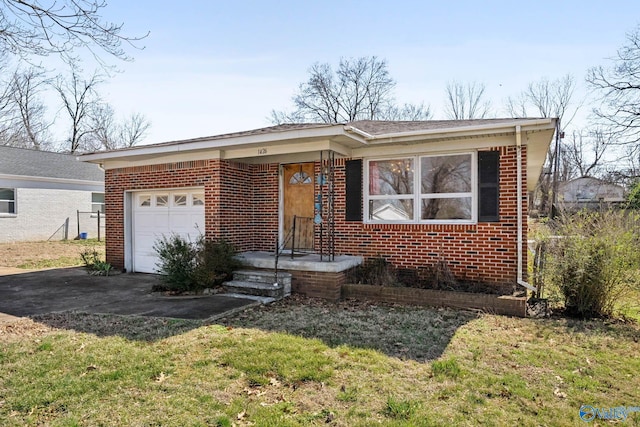 ranch-style home with a front lawn, brick siding, and an attached garage