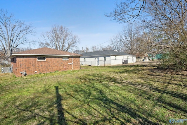 view of yard with fence