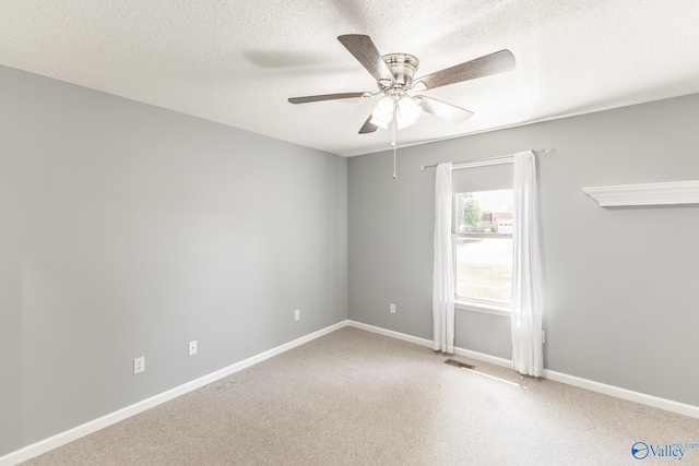 unfurnished room featuring a textured ceiling and ceiling fan