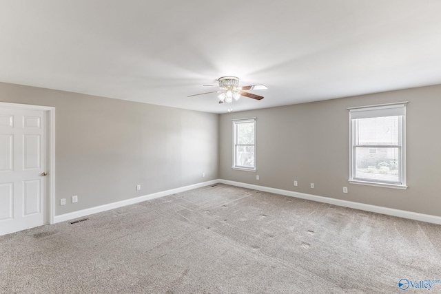 138 Singletree Dr, Hazel Green, AL 35750 - empty room featuring visible vents, carpet flooring, baseboards, and ceiling fan