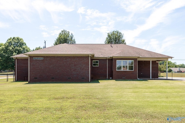 138 Singletree Dr, Hazel Green, AL 35750 - rear view of property featuring crawl space, a lawn, brick siding, and fence
