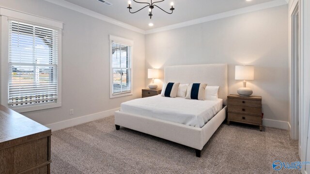 carpeted bedroom with crown molding, multiple windows, and a chandelier