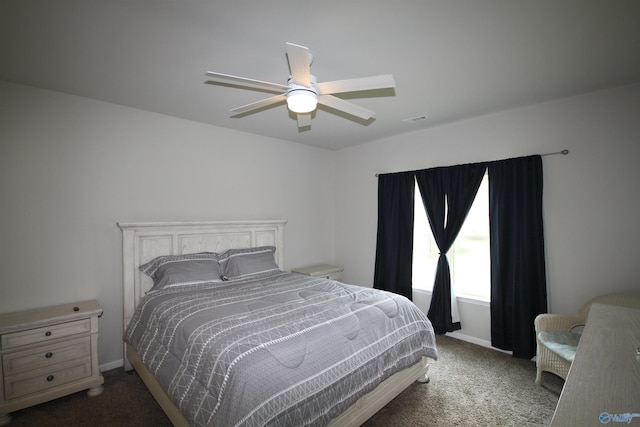 bedroom featuring carpet floors, baseboards, ceiling fan, and visible vents