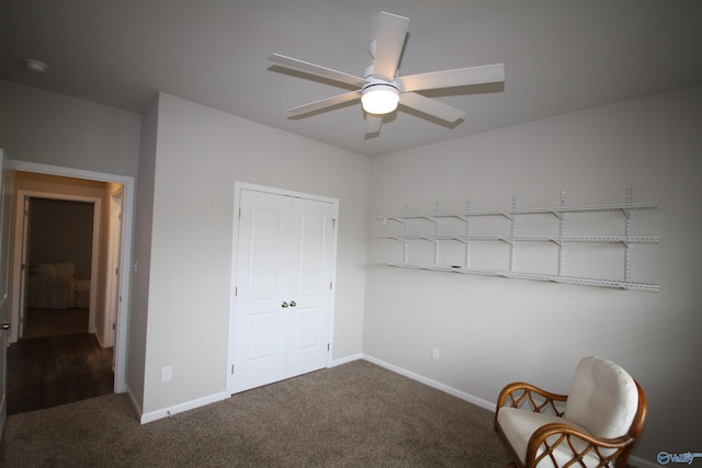 unfurnished room with baseboards, carpet, and a ceiling fan