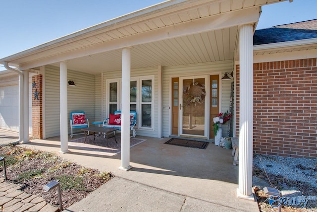 entrance to property with a porch