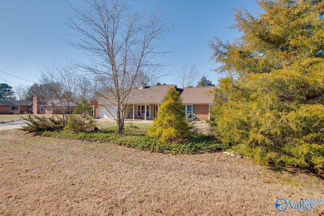 view of property exterior featuring a lawn