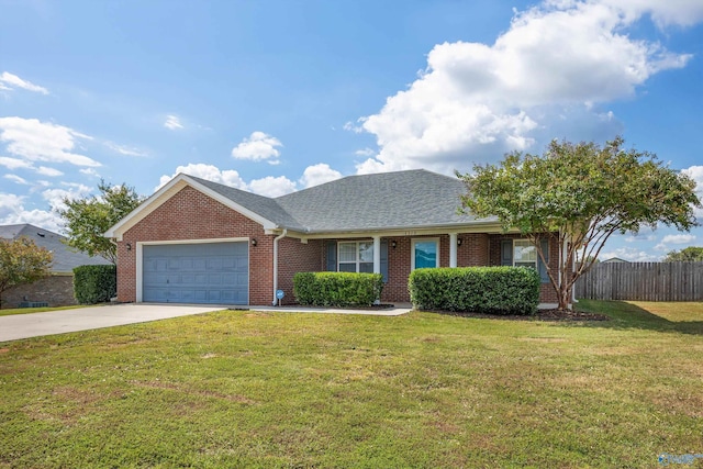 ranch-style home with a front yard and a garage