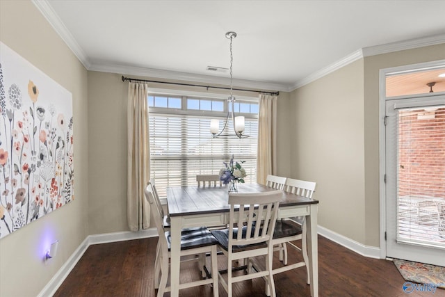 dining space featuring ornamental molding, a healthy amount of sunlight, and dark hardwood / wood-style flooring