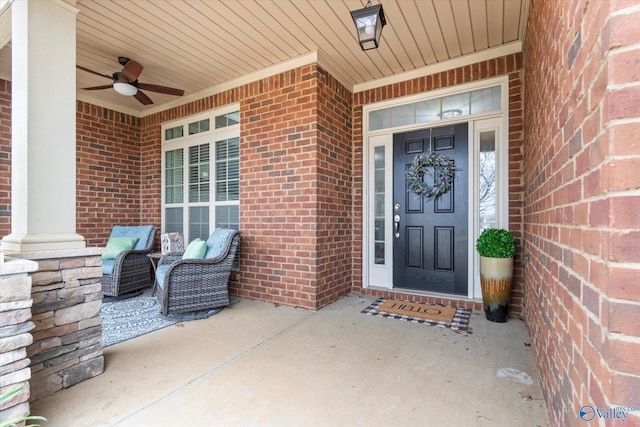 view of exterior entry with ceiling fan