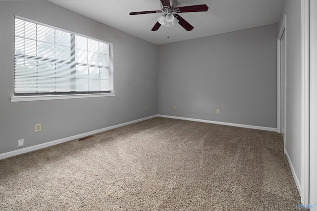 unfurnished bedroom with ceiling fan and carpet flooring