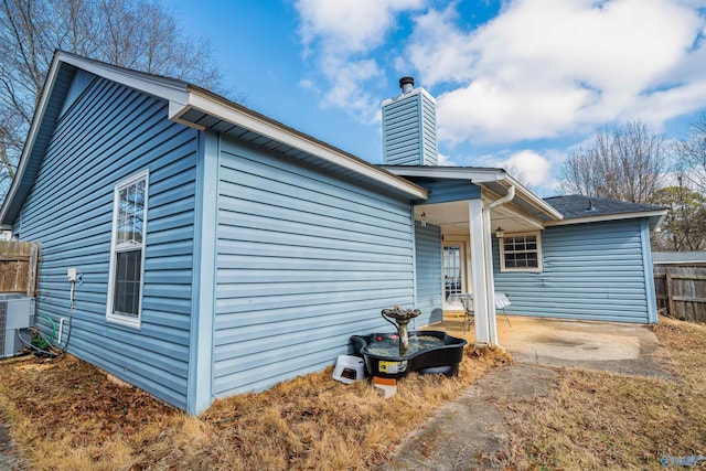 view of front of home with central air condition unit