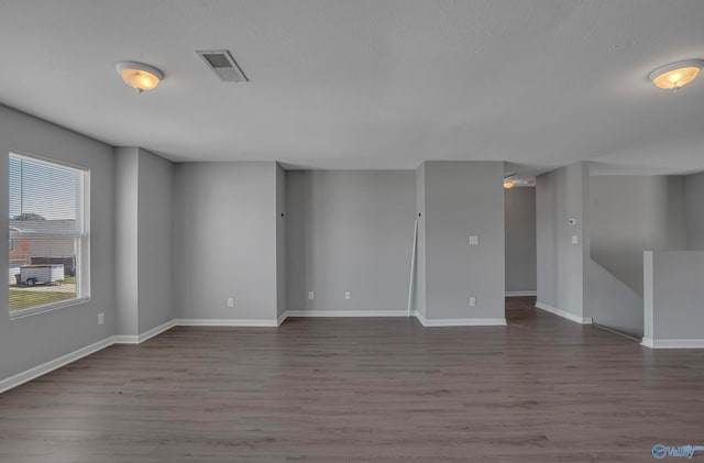 unfurnished room featuring wood-type flooring