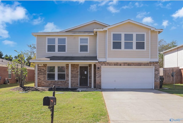 view of front of home featuring a front yard and a garage