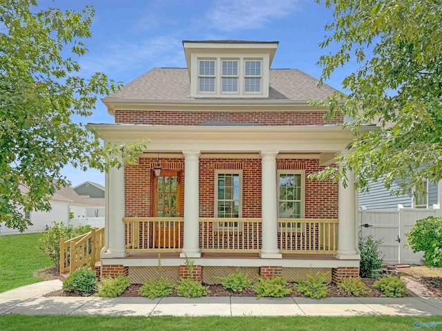 view of front of property featuring covered porch