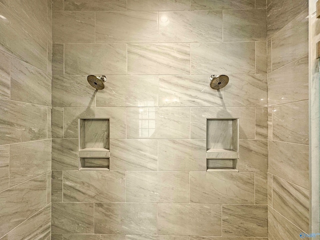 details featuring tiled shower