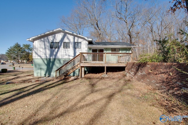 rear view of property with a deck