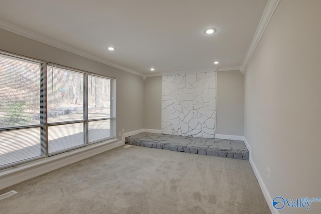 carpeted empty room with ornamental molding