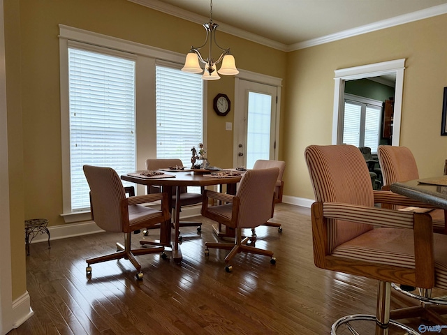 dining room with baseboards, an inviting chandelier, crown molding, and dark wood-type flooring