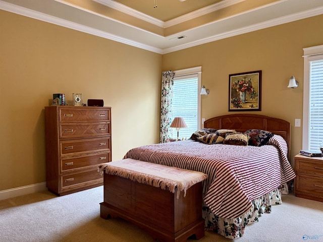 bedroom featuring baseboards, a raised ceiling, ornamental molding, and light colored carpet