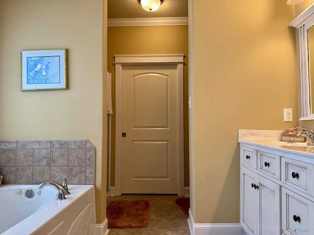 bathroom featuring a bath, baseboards, vanity, and crown molding