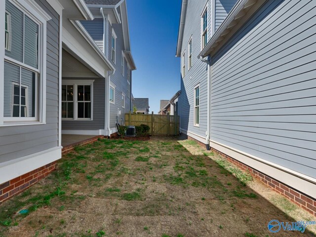 view of yard featuring central AC unit