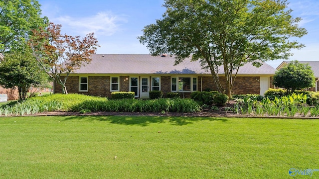 2302 Auburn Dr, Decatur, AL 35603 - single story home featuring a front yard and brick siding