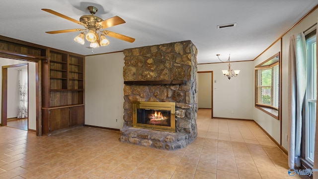 2302 Auburn Dr, Decatur, AL 35603 - unfurnished living room with crown molding, a chandelier, a fireplace, baseboards, and built in features