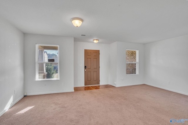 empty room with light carpet