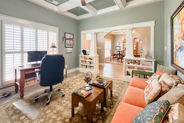 office with ornate columns, coffered ceiling, arched walkways, beam ceiling, and baseboards