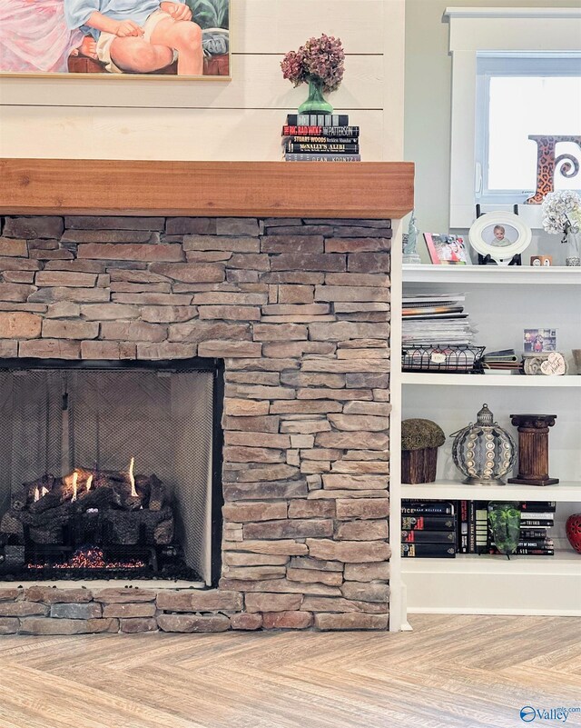 details featuring a stone fireplace