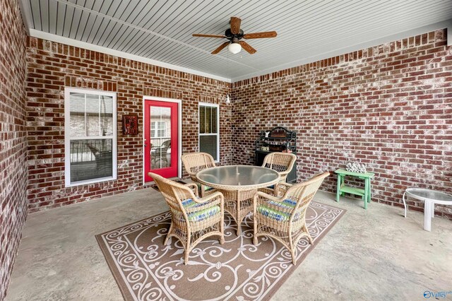 view of patio / terrace with outdoor dining space and ceiling fan