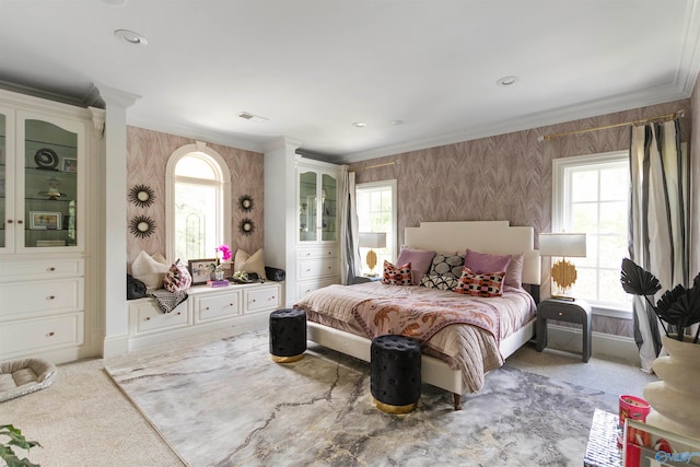 carpeted bedroom with ornamental molding and multiple windows