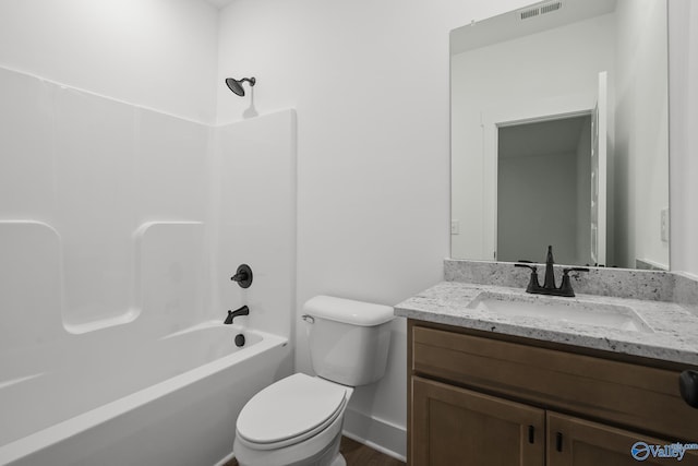 full bathroom with vanity,  shower combination, and toilet