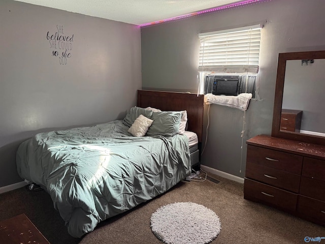 bedroom featuring cooling unit and carpet floors