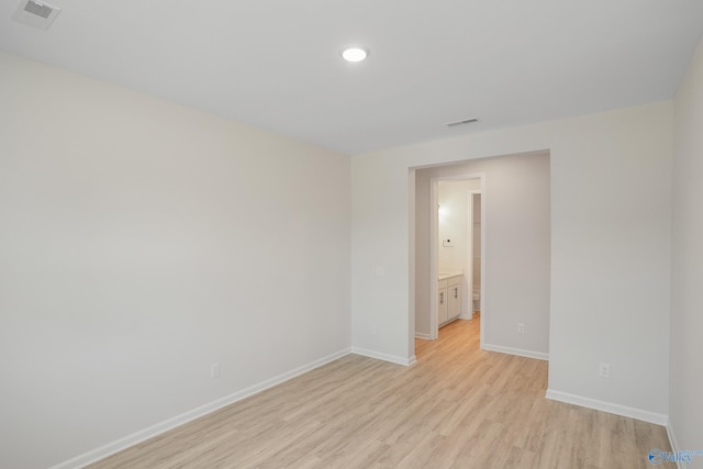 empty room featuring light hardwood / wood-style floors