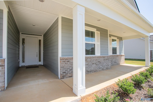 entrance to property with a porch