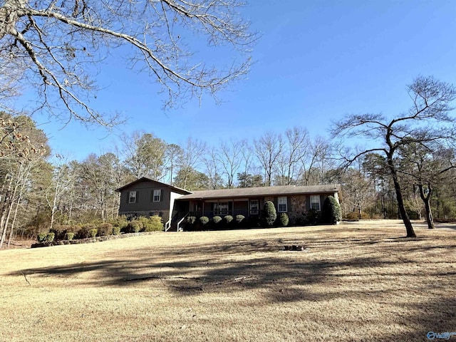 exterior space featuring a front yard